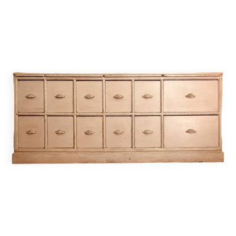 Solid wood sideboard with drawers.