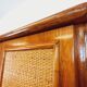 Vintage woven rattan and wood armoire by Maugrion for Roche-Bobois.