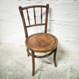 Antique children's chair in curved wood