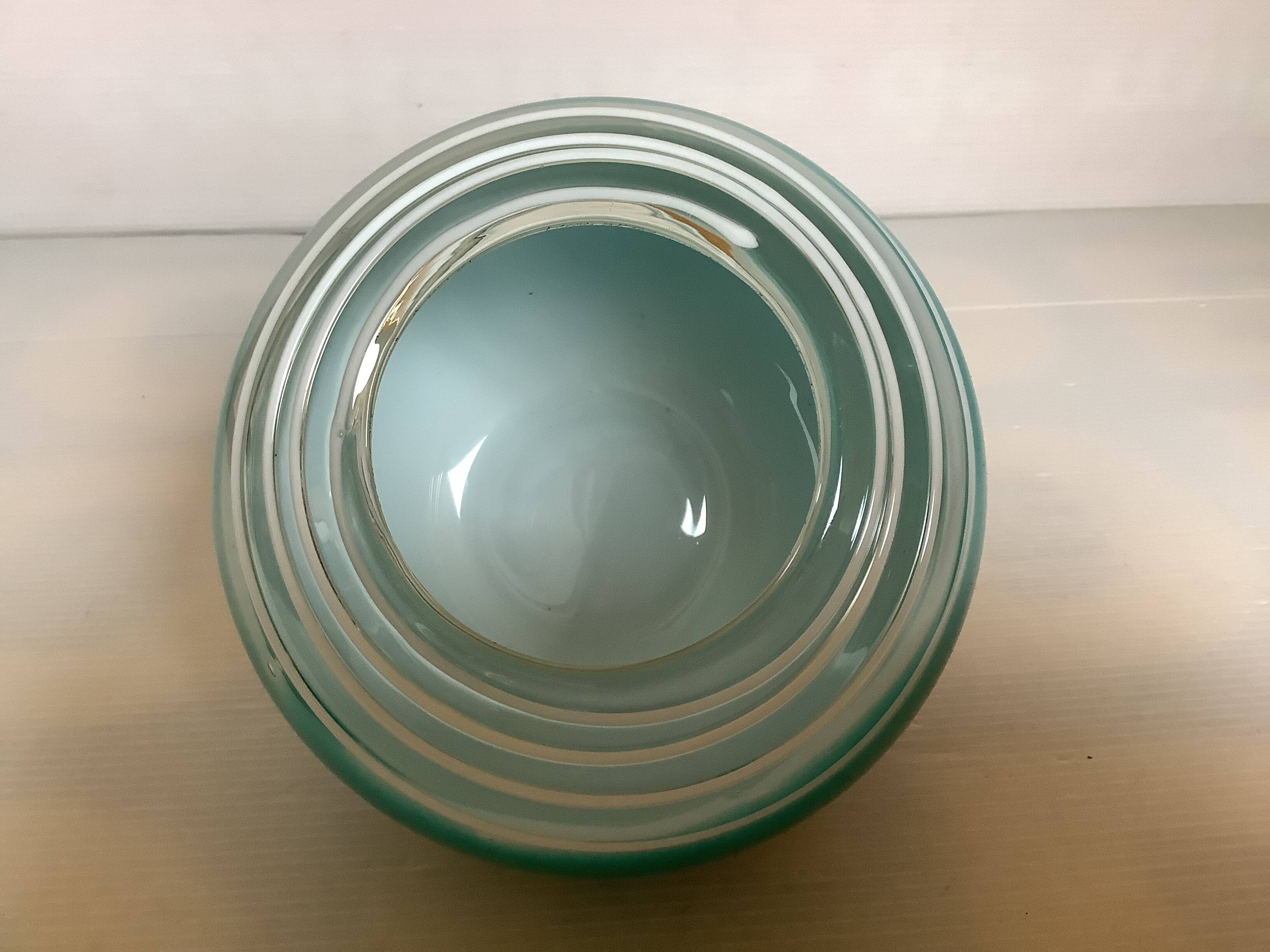 Small turquoise blue Murano style vase