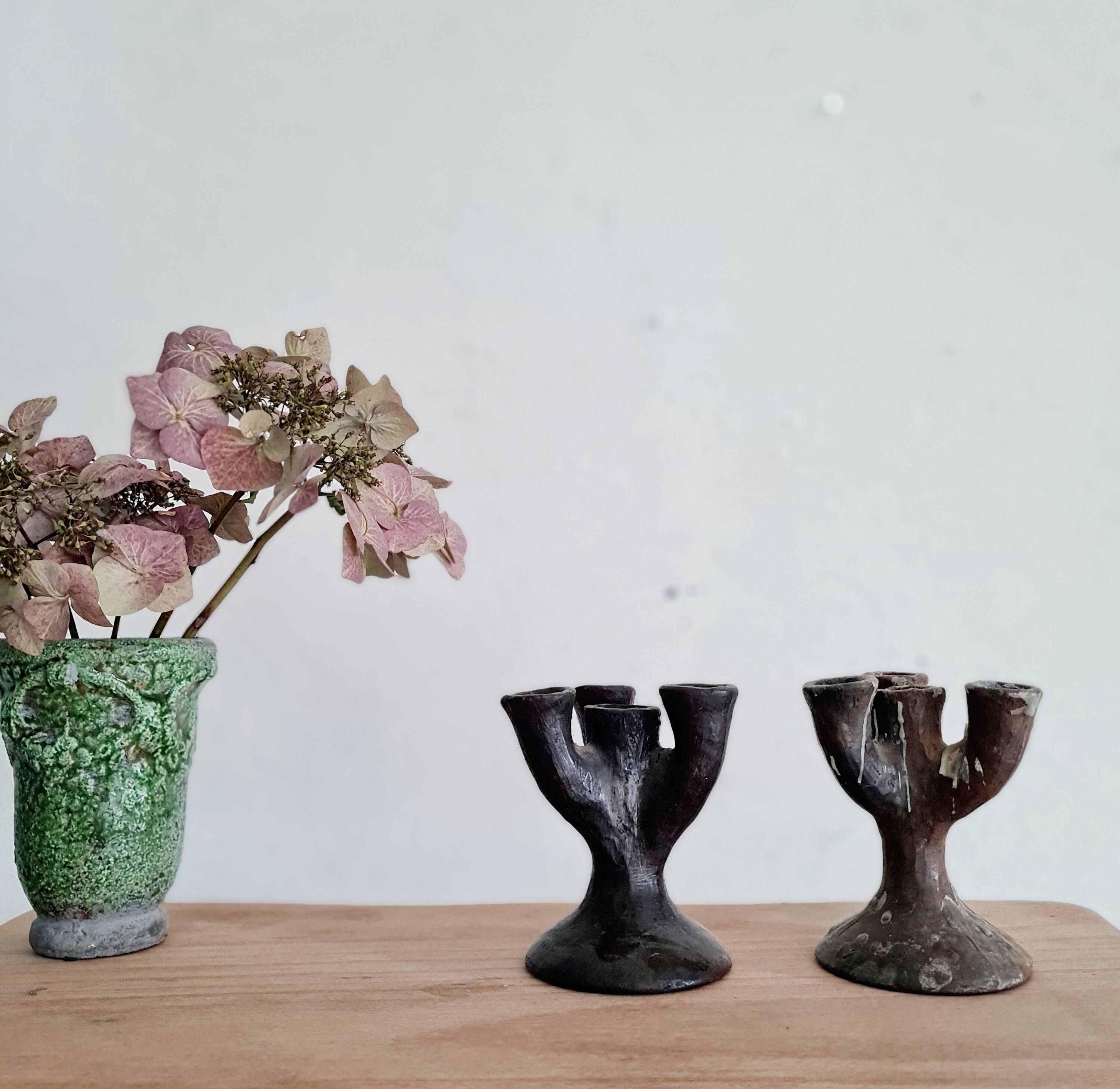Antique terracotta candlesticks