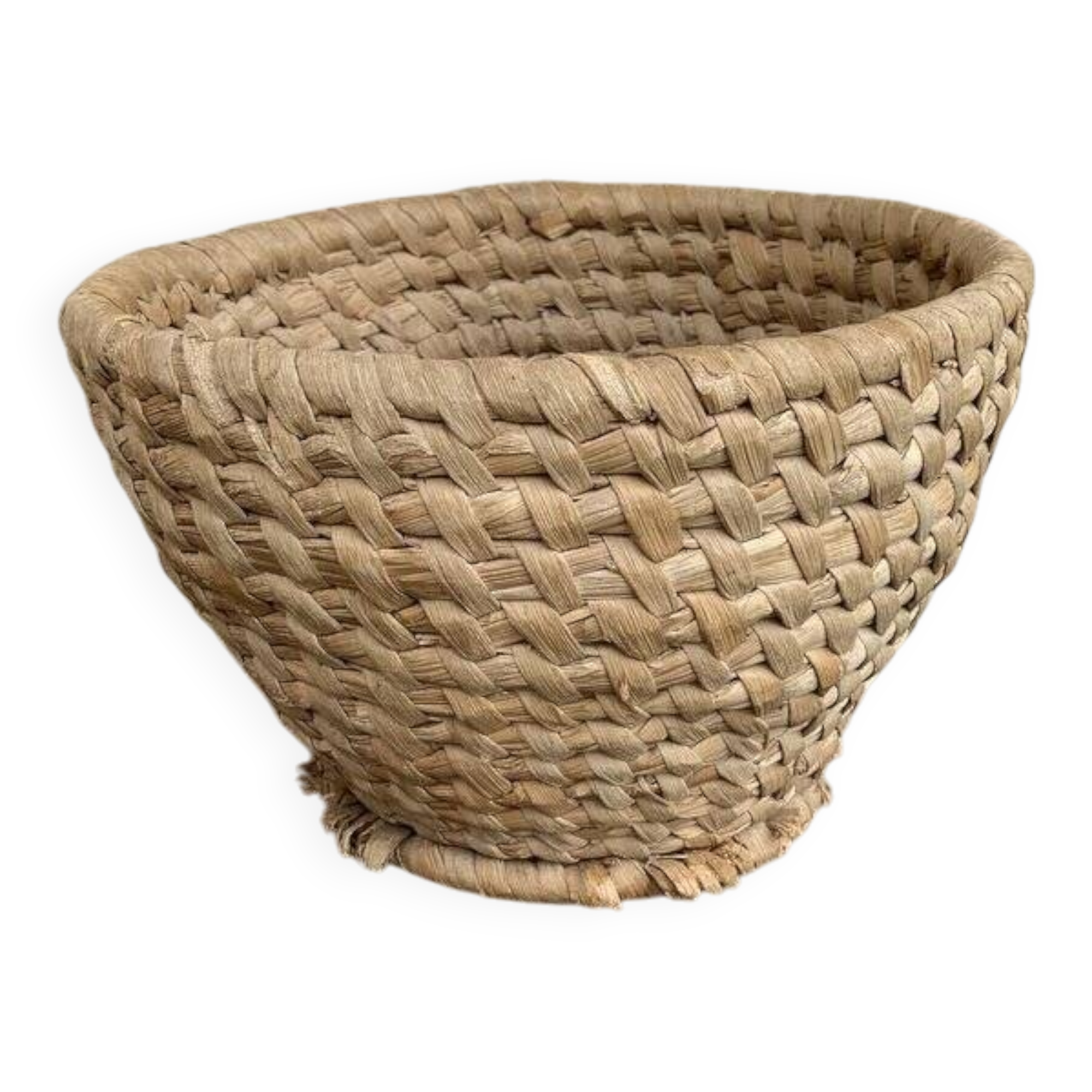 Brown woven wicker basket for collecting eggs — France, 1940s