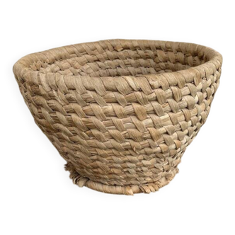 Brown woven wicker basket for collecting eggs — France, 1940s