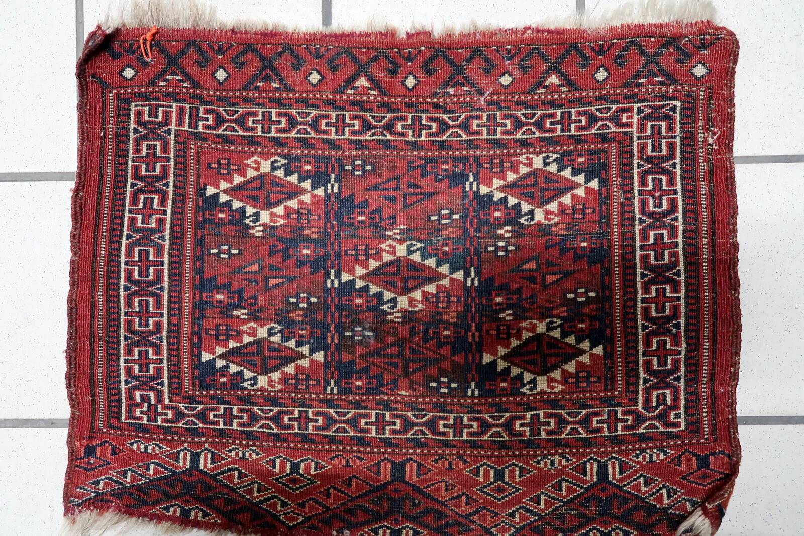 Handmade antique Turkmen Yomud collectible mat rug 40cm x 51cm, 1900s
