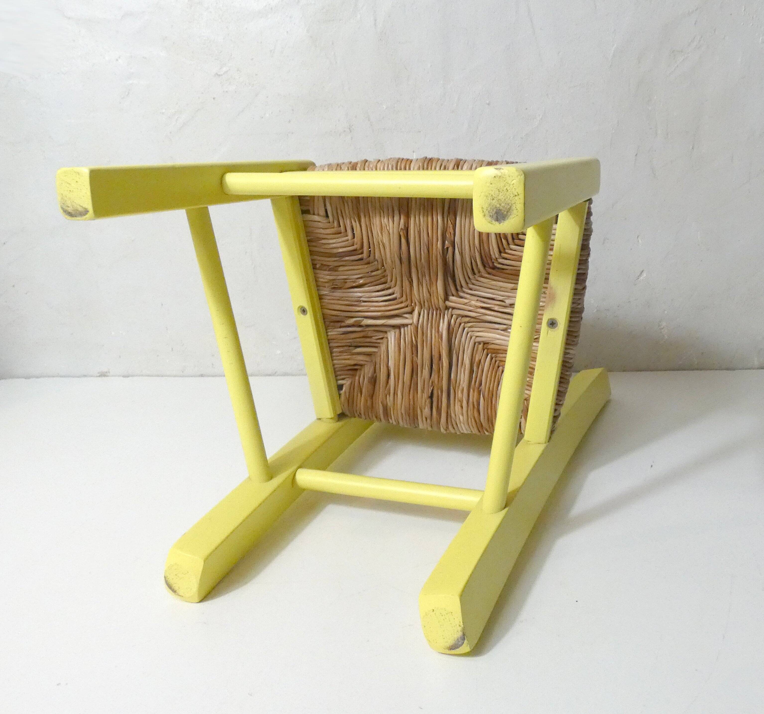 small yellow wooden children's chair