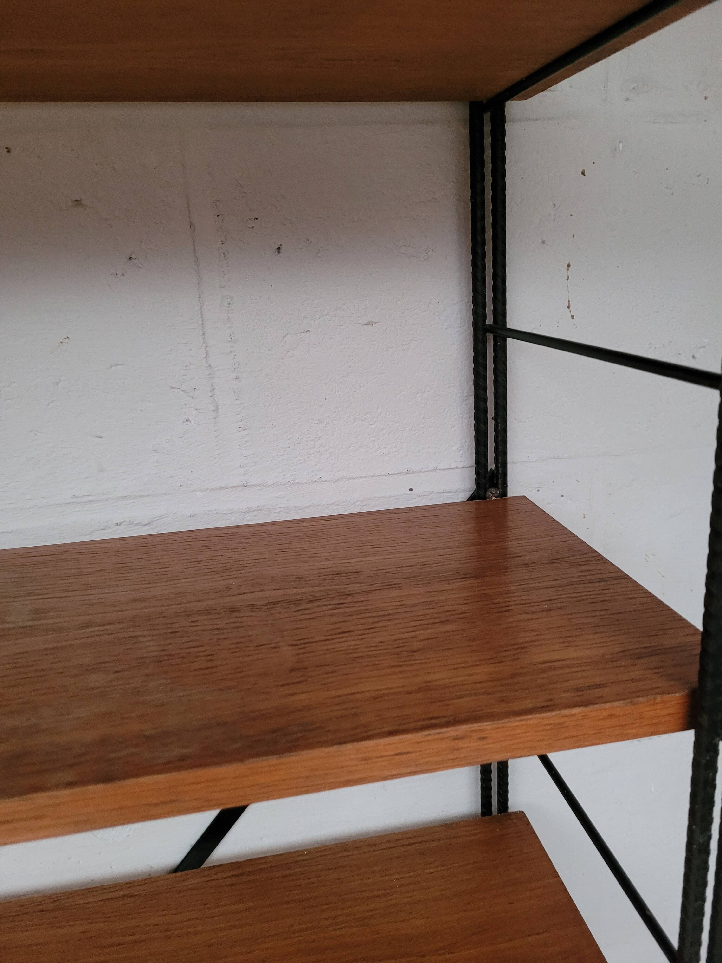 String bookcase on legs from the 50s