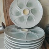 8 assiettes a huîtres en barbotine par Salins