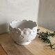 White ceramic pot cover