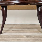 Mid-century mahogany buffet with teal glass and compartments with a drawer.