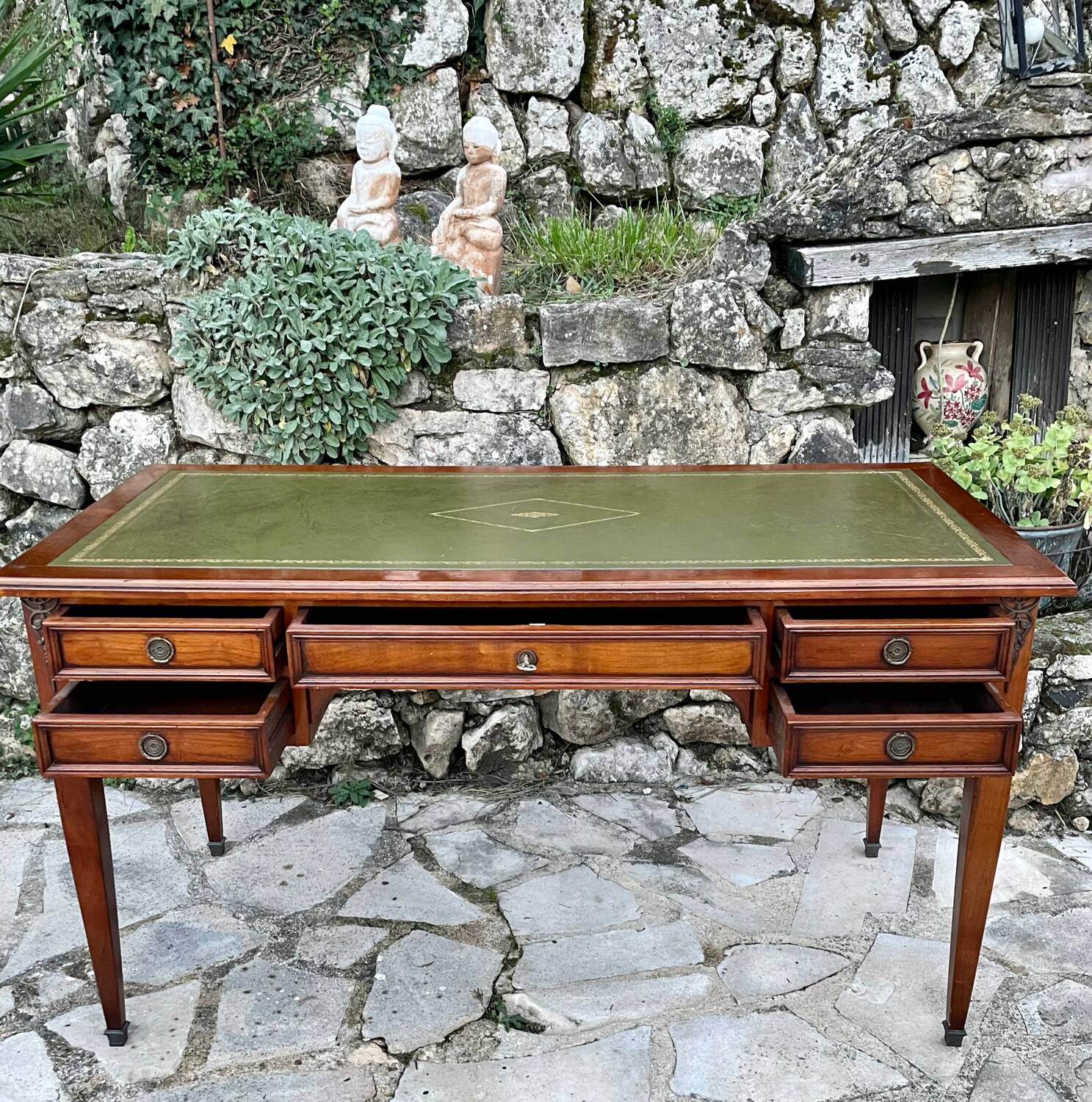 Elegant Louis XVI style mahogany flat desk from the 20th century