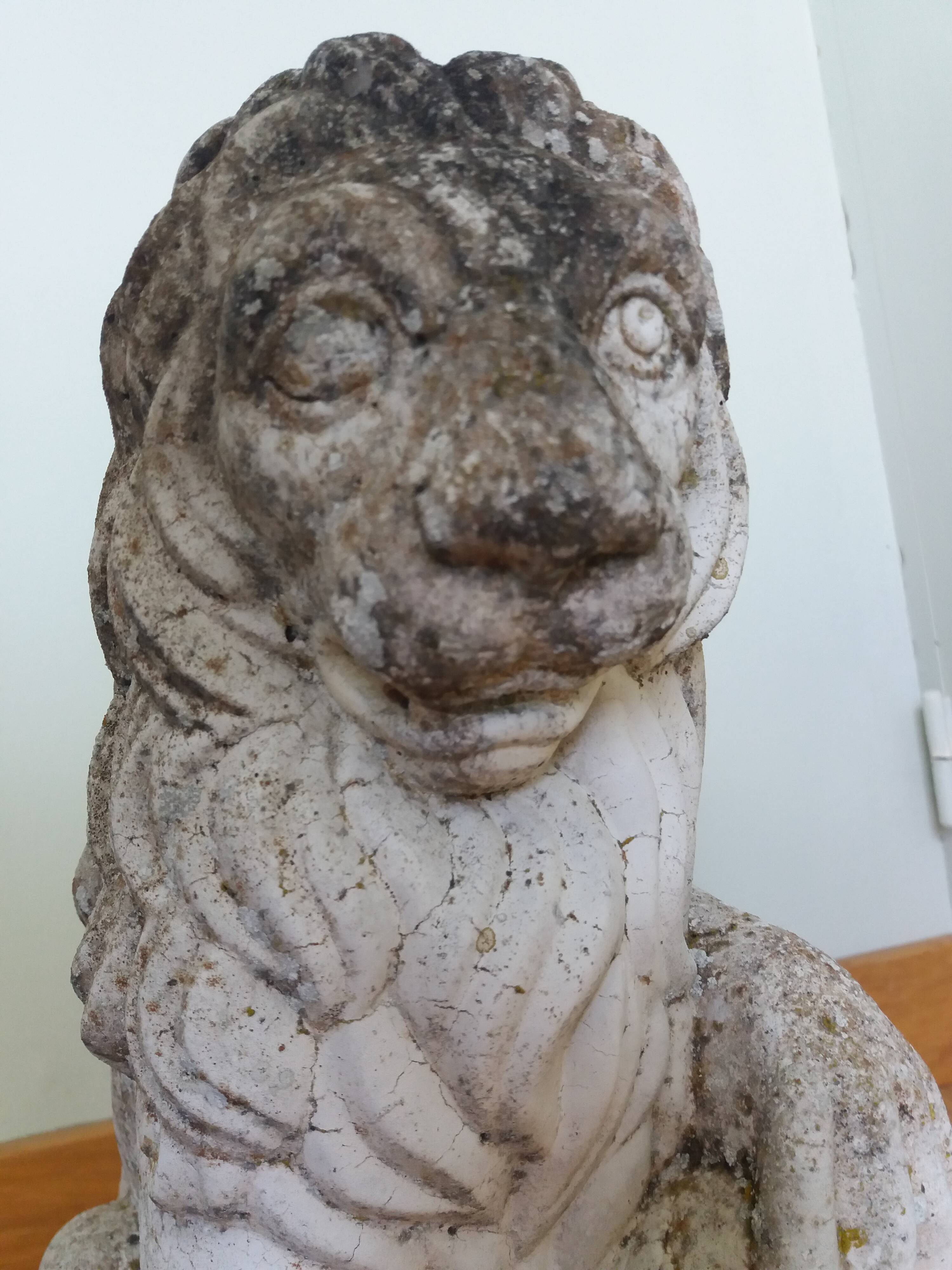 Lion garden statue in reconstituted stone