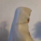 Religious statuette of the Virgin Mary in bisque porcelain