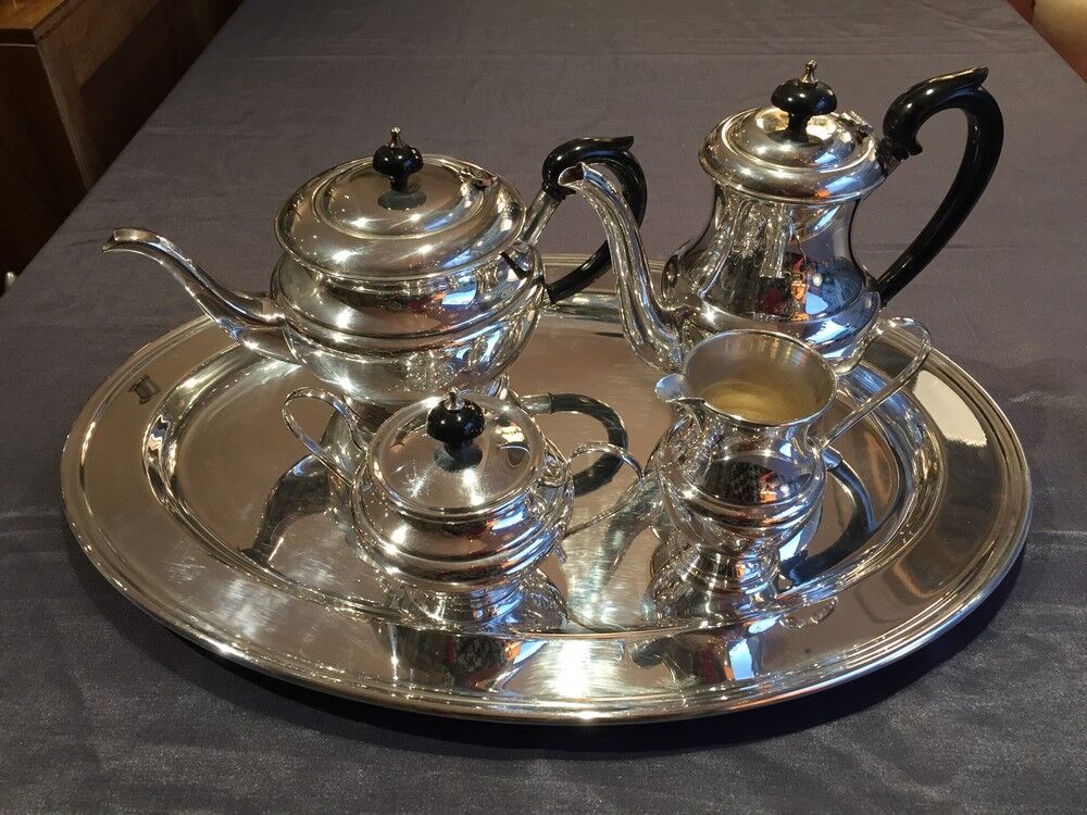 Coffee and the service in silver metal flagship