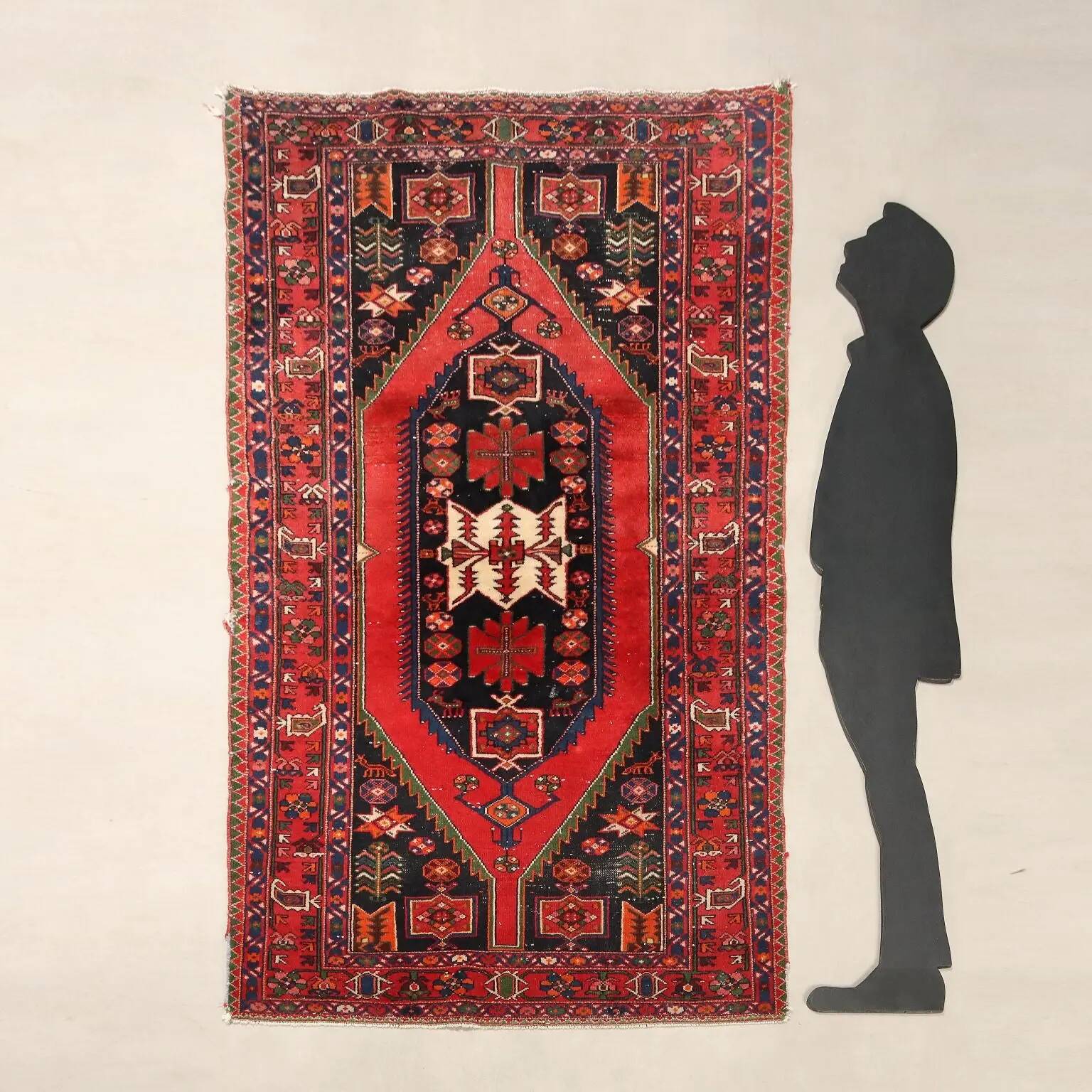 Ancient Asian rug made of cotton and wool, large knot.