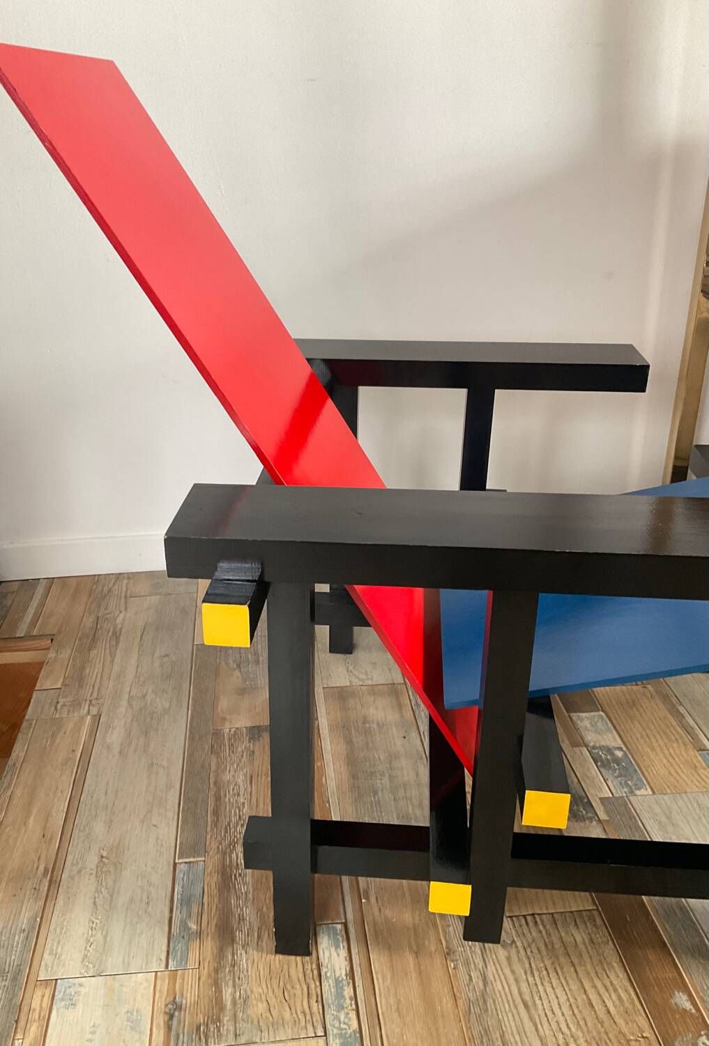 “Red and blue” lounge chair in the style of Gerrit Rietveld