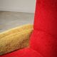 Red and mustard yellow fabric armchair in 1970s style