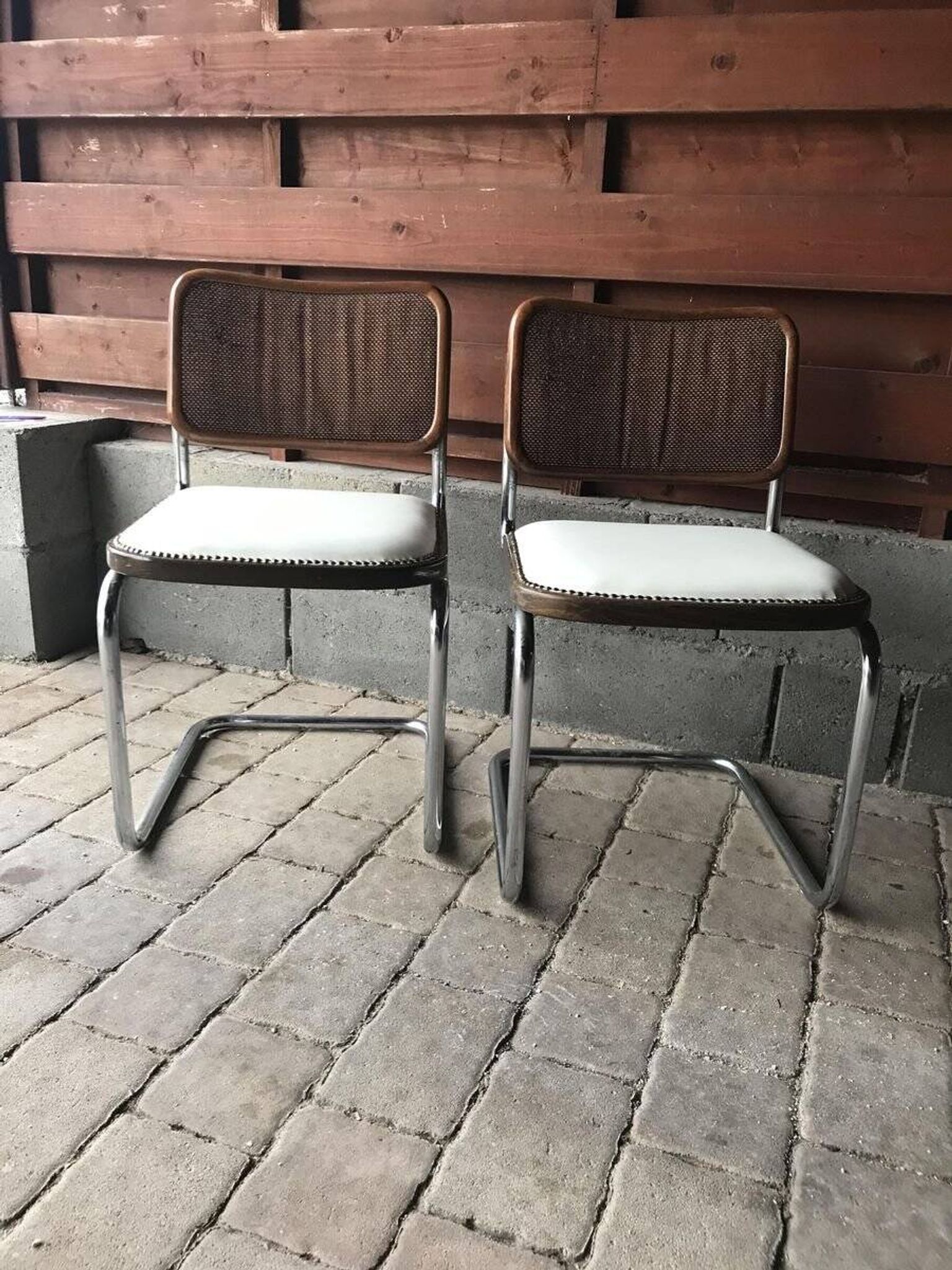 Set of 4 Mid-Century brown faux leather chairs with wood and chrome structure (1970s)