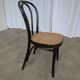 Chaise de salle à manger vintage style Thonet en bois noir et assise en cannage 1970
