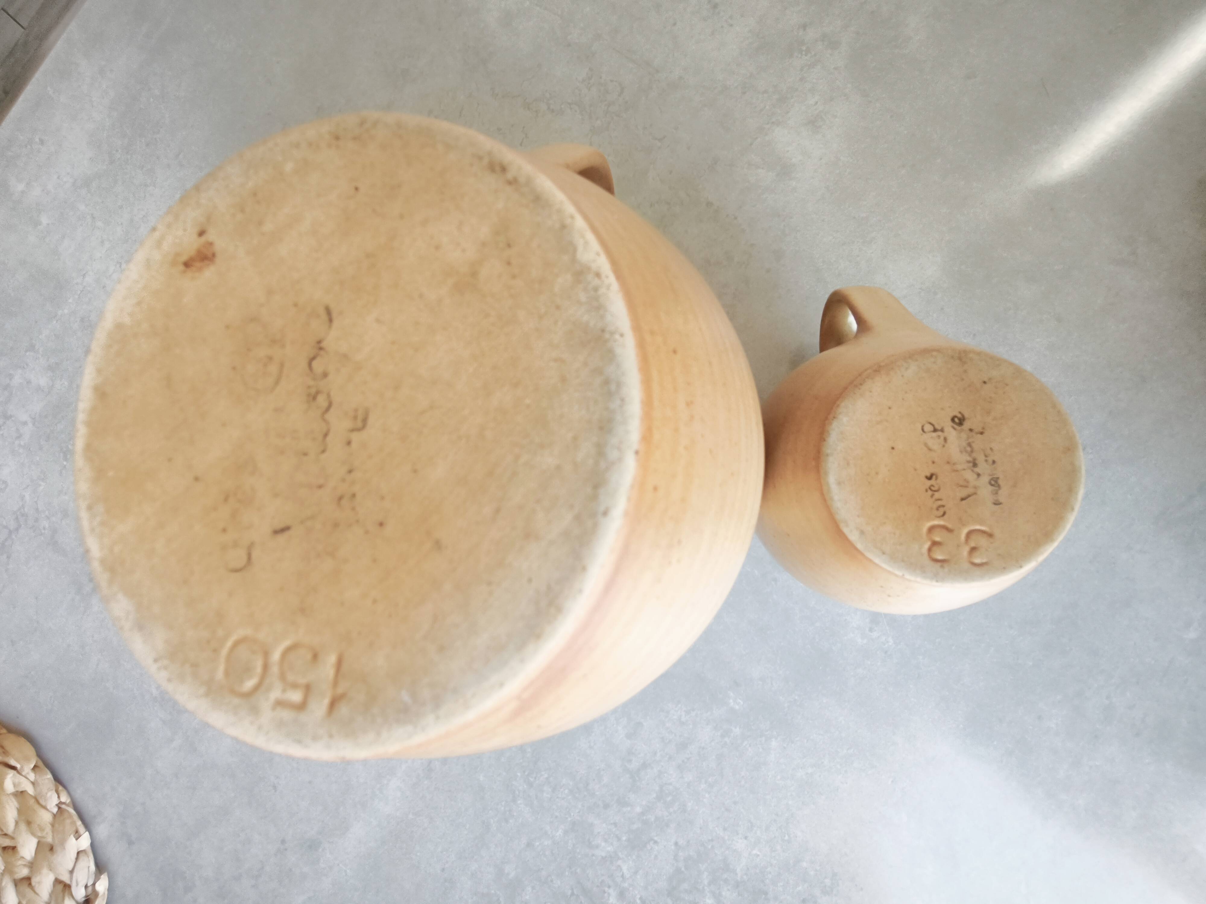 Set of two Village de France stoneware pitchers