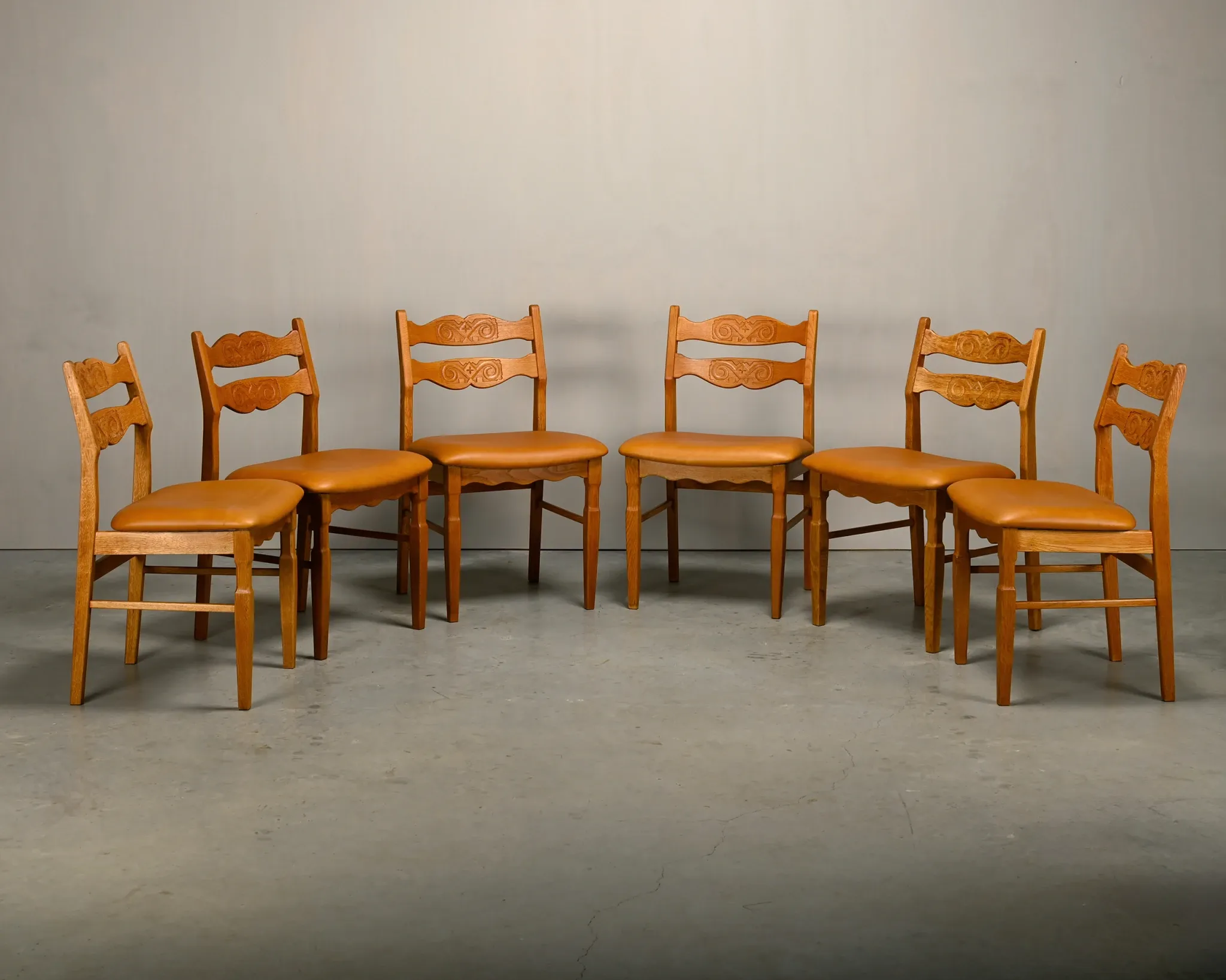 Razorblade style dining chairs by Henning Kjærnulf Oak and Leather Denmark