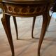 Living room table in Louis XV-Louis XVI transitional style with marquetry and bronze.