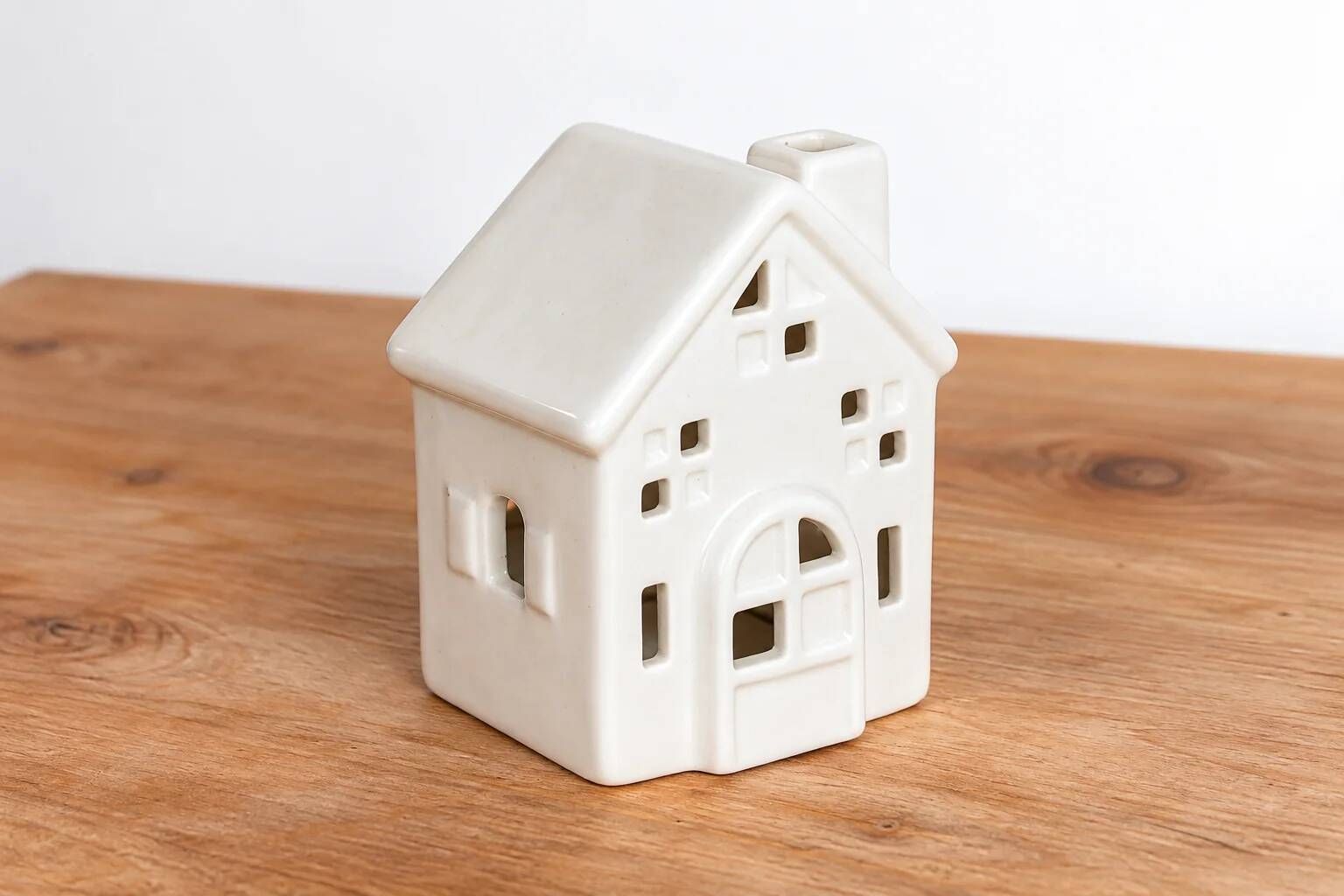 White perforated ceramic house lantern – Light decoration