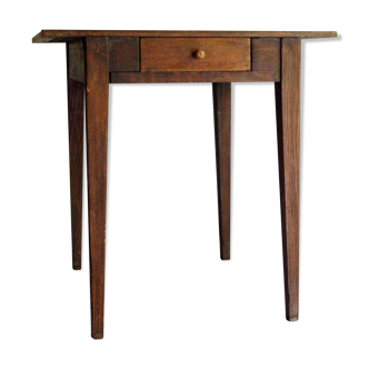 Old rustic wooden farmhouse table in 50s