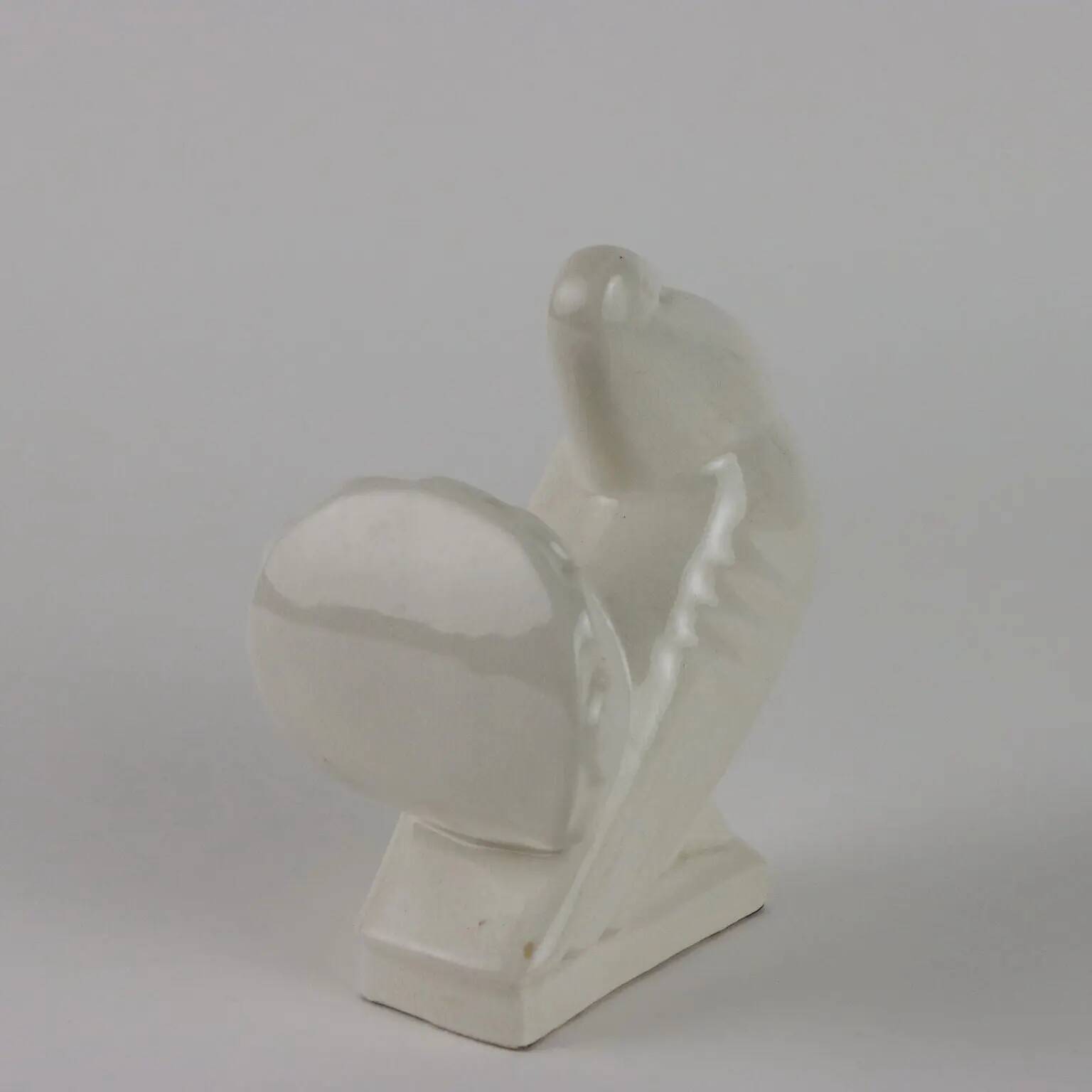 Ancient ceramic pigeon sculpture by George Ventrillon for Saint Clément.