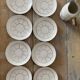 White and silver Limoges porcelain coffee cups and saucers.