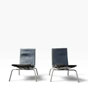 Set of 2 Crossed Legged lounge chairs by Fabiaan van Severen.