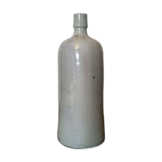 Old stoneware milk bottle