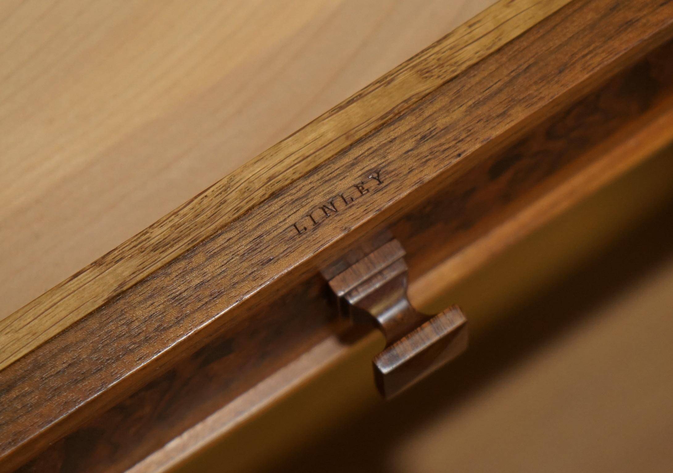 David Linley Burr walnut chest of drawers for light restoration.