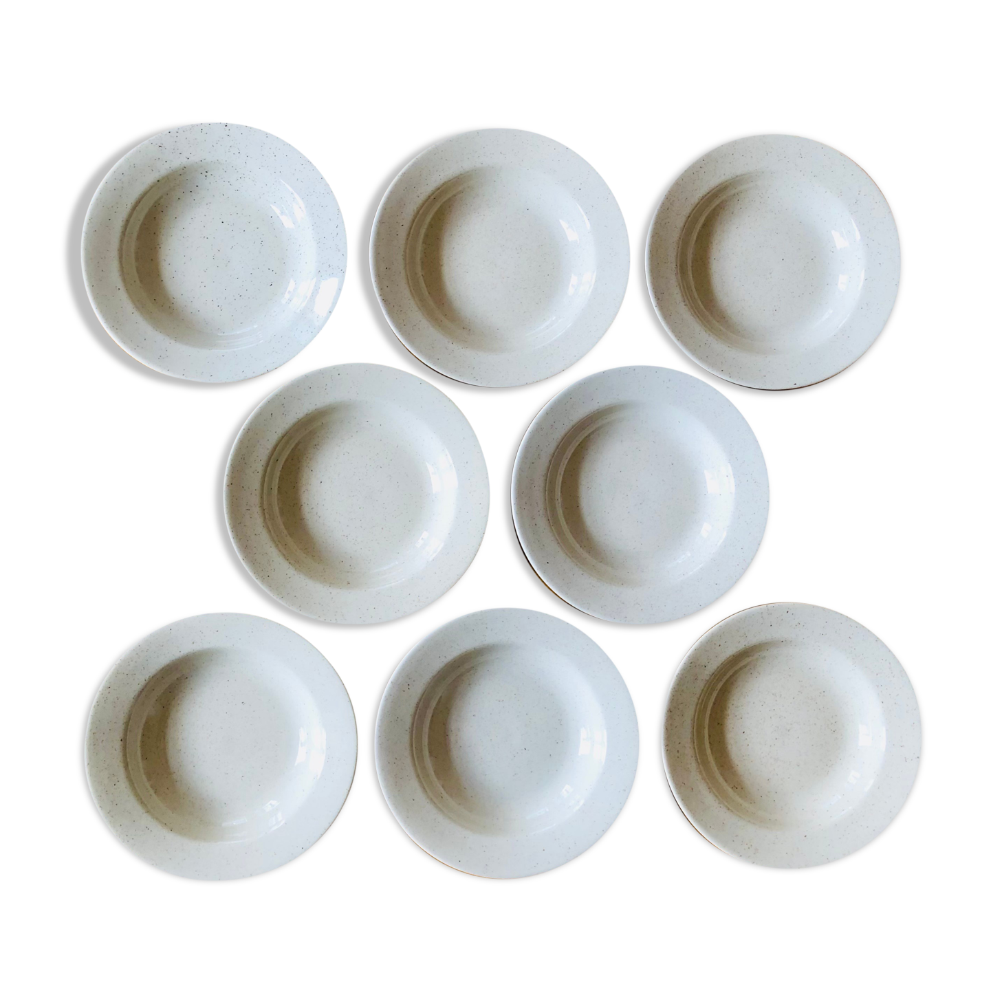 Set of 8 hollow plates in speckled ceramic