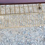 Side table of the 60s mahogany and gold metal range discs