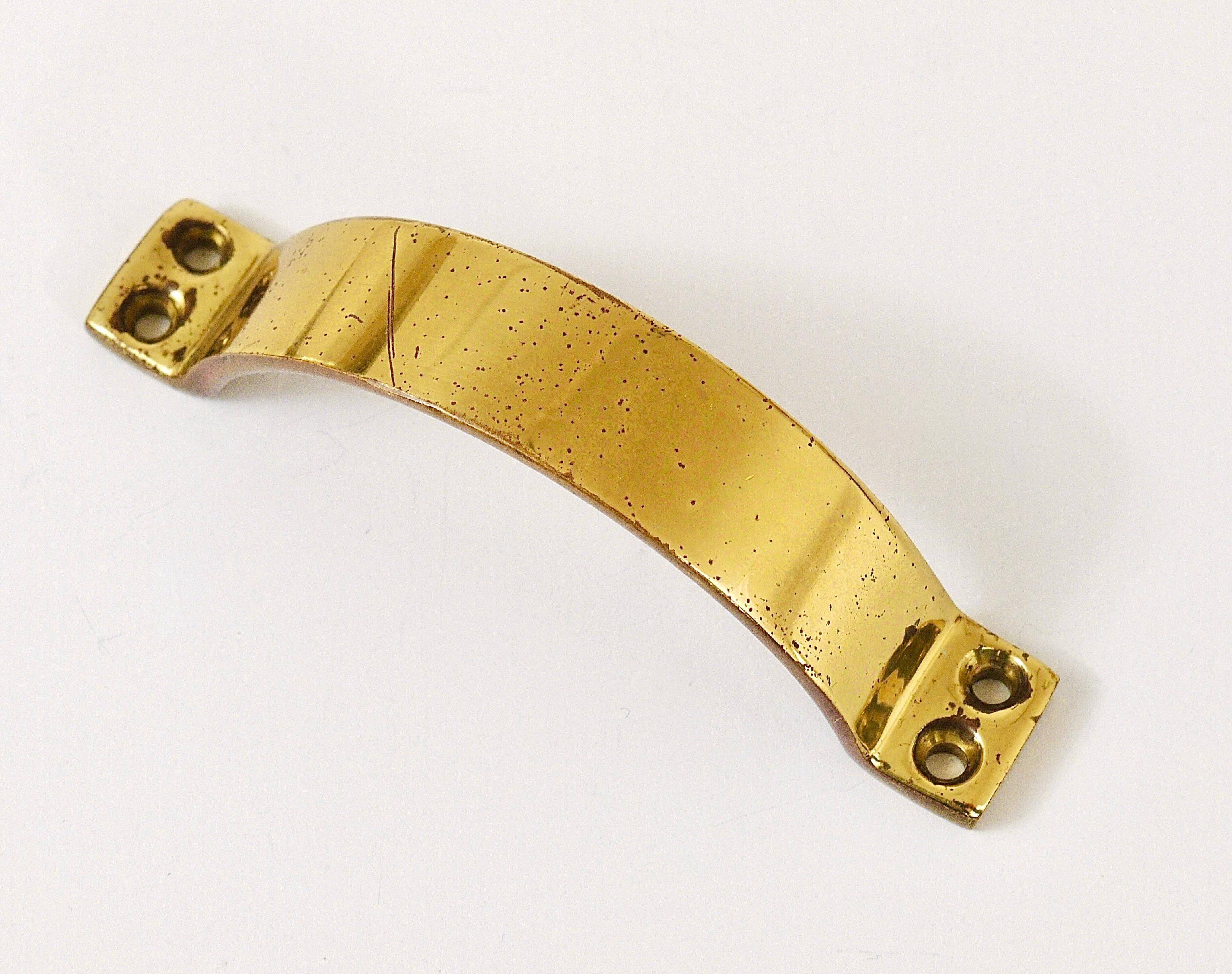 Up to 50 mid-century brass handles for doors, drawers, chests of drawers, Austria, 1950s.