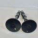 Pair of antique ebonised wooden candlesticks from the 19th century.