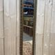 Petit miroir d'entre deux en bois doré