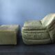 Laauser lounge chair and ottoman in olive green patchwork leather, 1970s