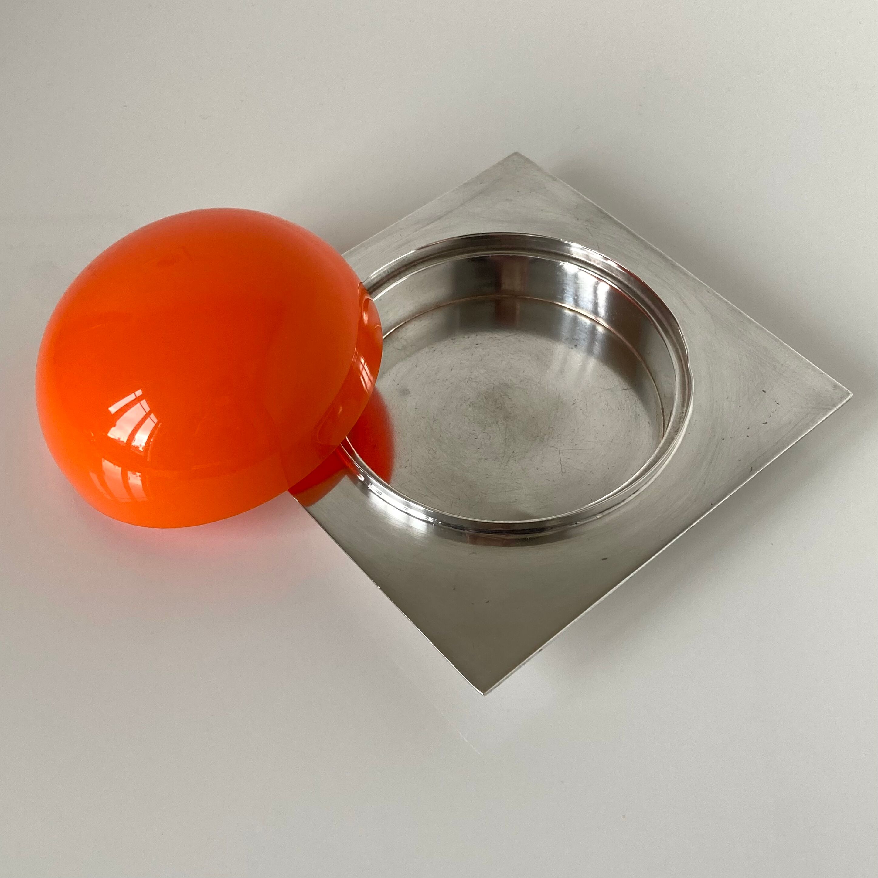 Box covered in silver metal and orange ABS by Lino Sabattini for Gallia by Christofle