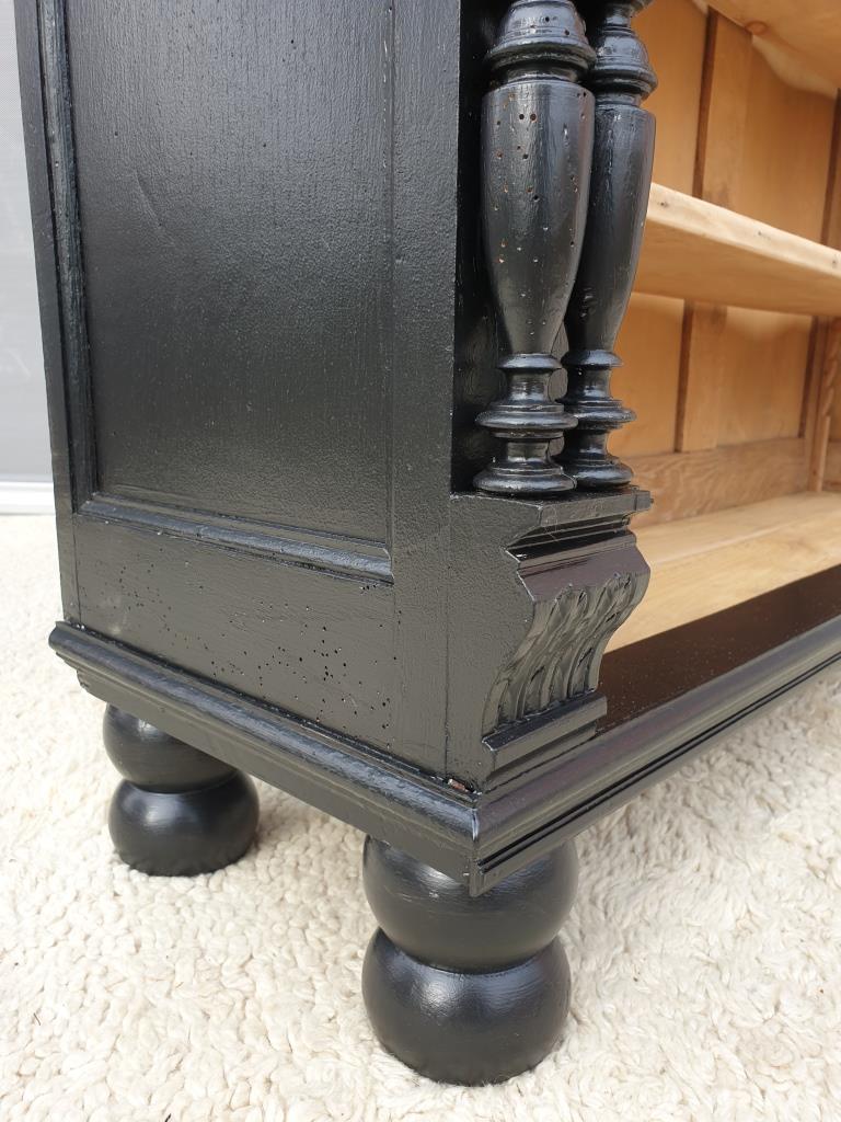 Neoclassical black wood bookcase with columns