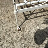 Ancient white metal bed