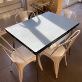 Blue Formica table for 4 to 6 people