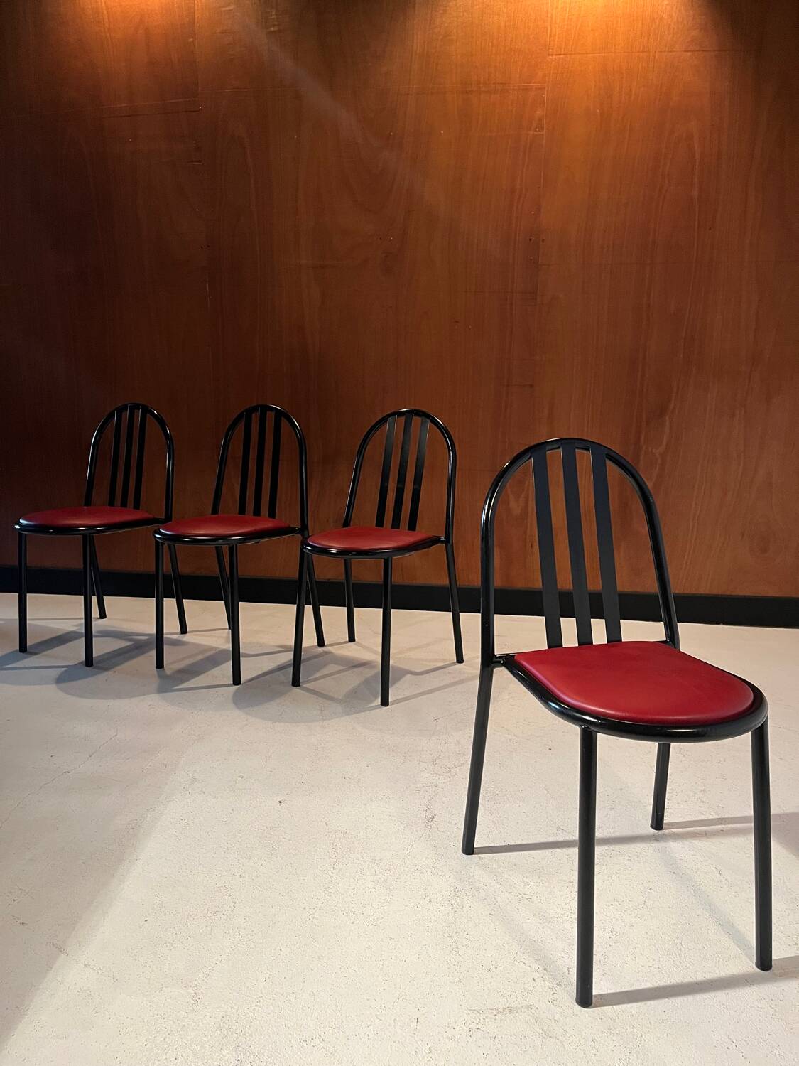 4 leather and steel chairs, designed by Robert Mallet-Stevens