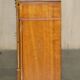 Vintage buffet made of mottled yew wood with three doors and four drawers.