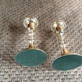 Pair of gold metal candle holders