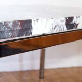 Coffee table in resin and chrome metal