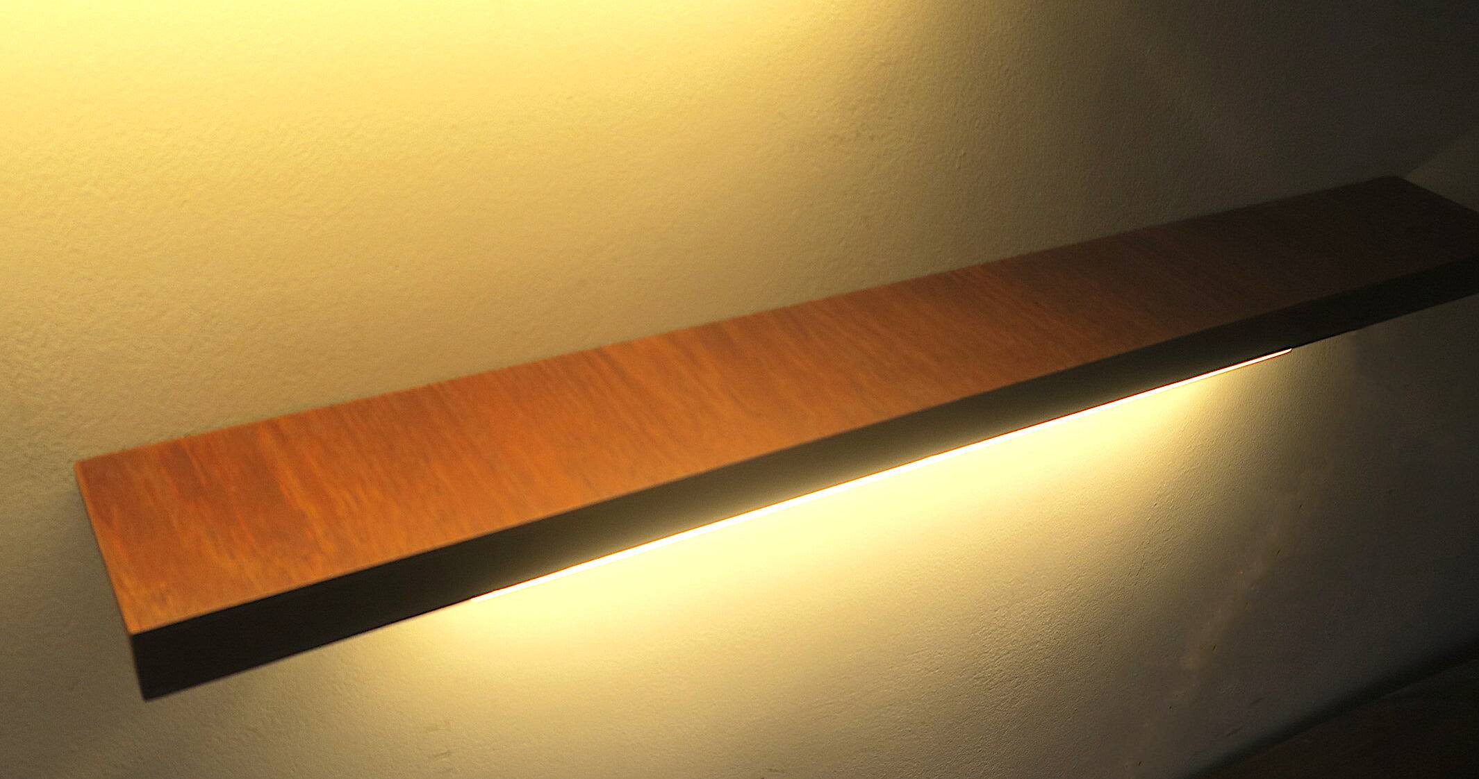 Pairb of Danish teak shelves with wall lights, 1960s