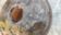 Flattened spherical vase made of glass paste