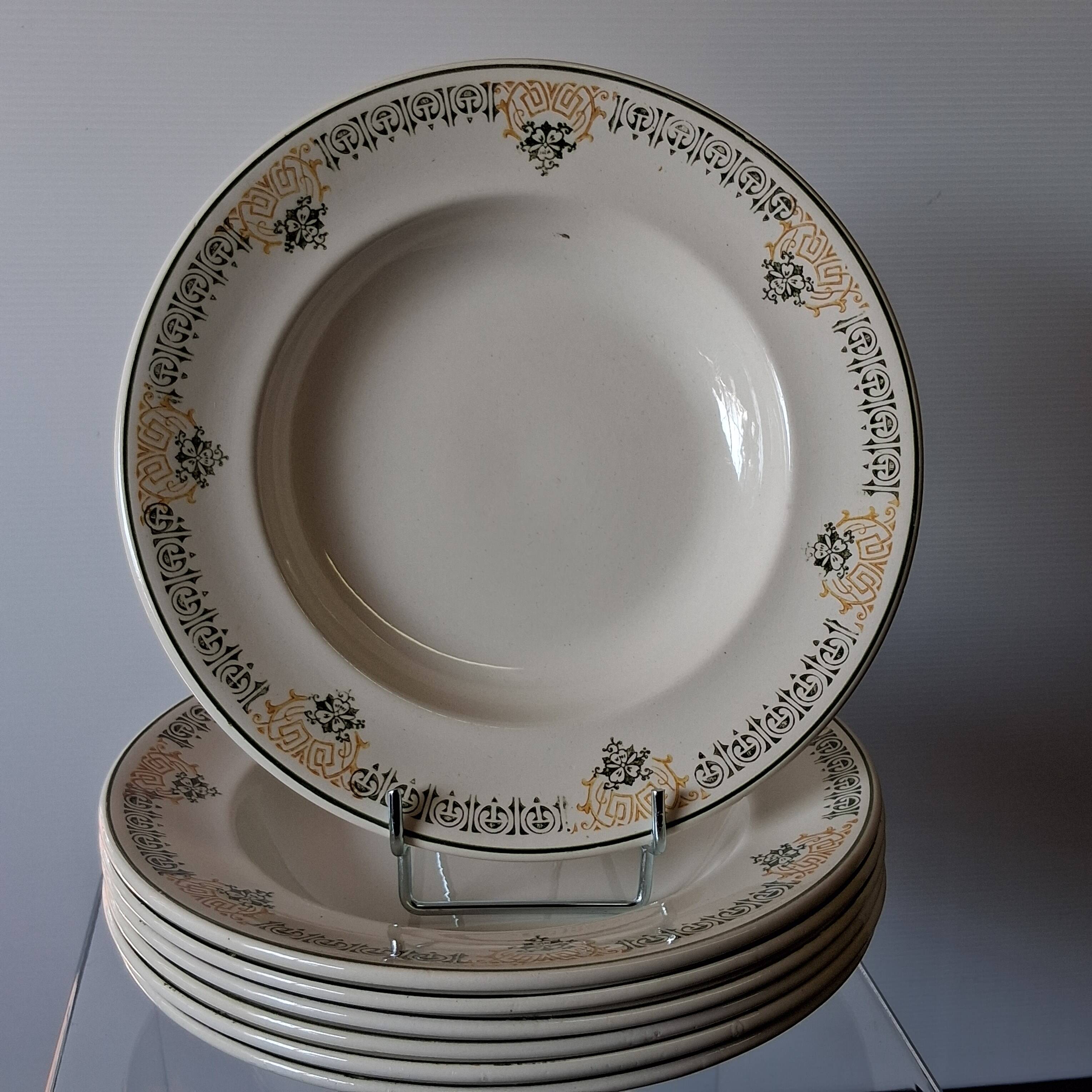 Set of 7 antique deep plates from Longwy, "Savigny" model, in good condition.