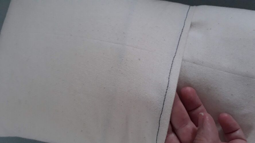 Cushion cover Bee fabrics on emerald green background